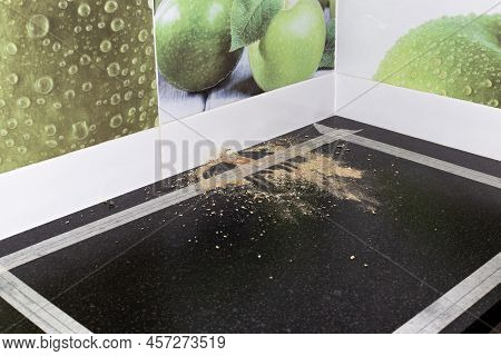 Installation Of A Kitchen Countertop Sink And Faucet. The Black Countertop Is Marked For Cutting A H