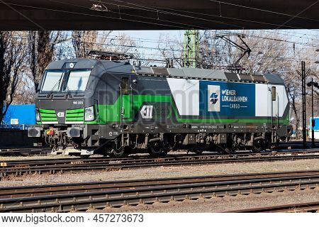 Budapest, Hungary - March 6, 2021: International Train Transportation. Locomotive Train At Station. 