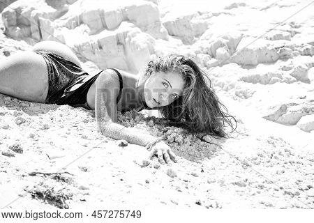 Sexy Summer Girl. Woman Lying In Sand On Beach. Vacation At Paradise. Summetime Mood.