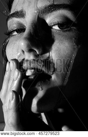 Closeup Of A Female Cheek With Honey. Portrait Of Sensual Girl With A Honey Facialmask Closeup. Beau