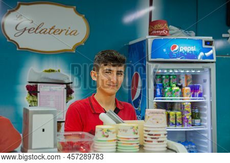 Turkey, Marmaris 05.06.2022: A Smile Boy Sells Turkish Ice Cream At A Resort In Turkey