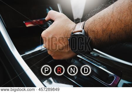The Driver Manually Picking The Automatic Gear Lever Position And P R N D Icon
