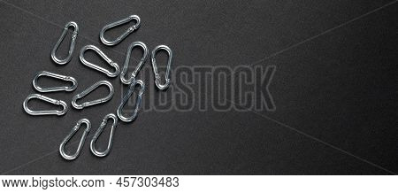 4mm Climbing Carabiner Isolated Against A Dark Background