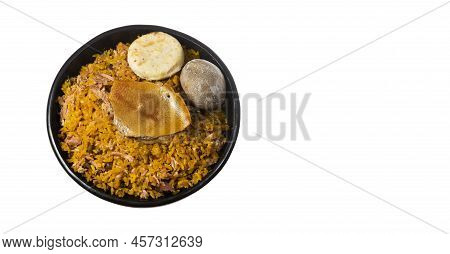 Typical Tolimense Lechona With Rice - Typical Colombian Dish