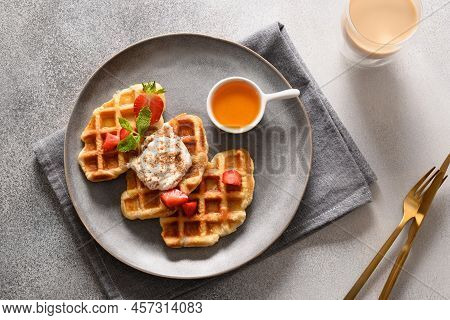 Trendy Breakfast With Croffles And Morning Coffee, Strawberries. Croissant As Waffle.