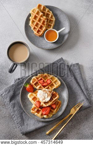 Trendy Breakfast With Croffles And Morning Coffee, Strawberries. Croissant As Waffle.
