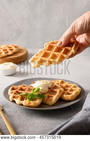 Woman Take Croffles. Delicious Breakfast. Croissant As Waffle.