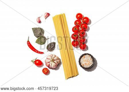 Traditional Ingredients For Cooking Classic Italian Spaghetti Isolated On White
