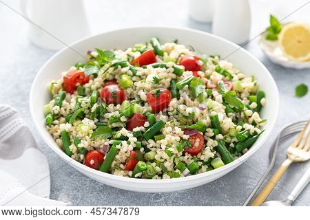 Tabbouleh Salad. Tabouli Salad With Fresh Parsley, Onions, Tomatoes, Bulgur And Green Beans. Healthy