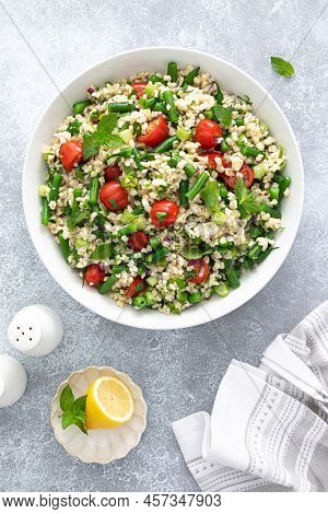 Tabbouleh Salad. Tabouli Salad With Fresh Parsley, Onions, Tomatoes, Bulgur And Green Beans. Healthy