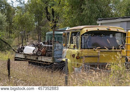 An Old Yellow Truck Full Of Rusting Sapphire Mining Equipment On Fossicking Gemfields At Rubyvale Qu