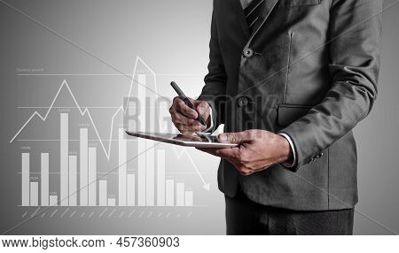 Businessman With Tablet Computer, Business Growth Concept