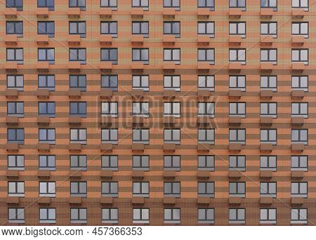 Facade Of A New Multi-apartment High-rise Residential Building With Windows Background. Architecture
