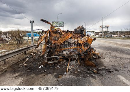 Hostomel, Kyev Region Ukraine - 09.04.2022: Burnt Military Vehicles Of Russian Soldiers On The Bridg