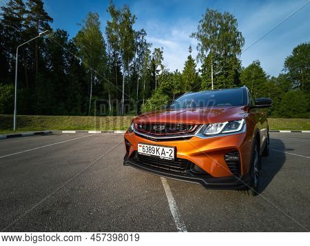 Minsk, Belarus - June 2022: Orange Geely Coolray Car.