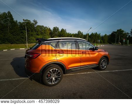 Minsk, Belarus - June 2022: Orange Geely Coolray Car.