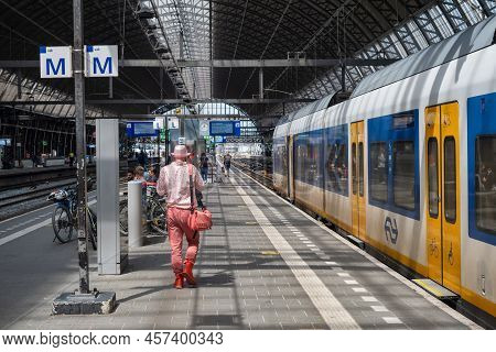 Amsterdam, The Netherlands - 21 June 2022: Nederlandse Spoorwegen Train In Amsterdam Central Station