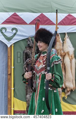 Yekaterinburg, Russia - June 25, 2022: Beautiful Asian Woman In Traditional Festive Bashkir Clothes,