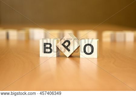 Bpo Text On Wooden Blocks, Financial Business Concept, Blue Background. Bpo - Short For Business Pro