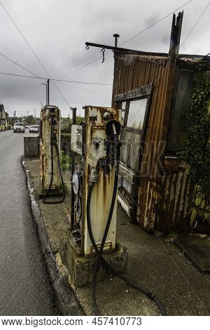 Editorial, Detail Of Derelict Vintage Filling Petrol Station, Portrait