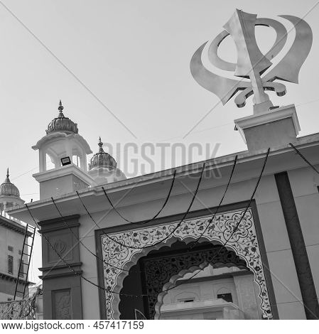 Khanda Sikh Holy Religious Symbol At Gurudwara Entrance With Bright Blue Sky Image Is Taken At Sis G