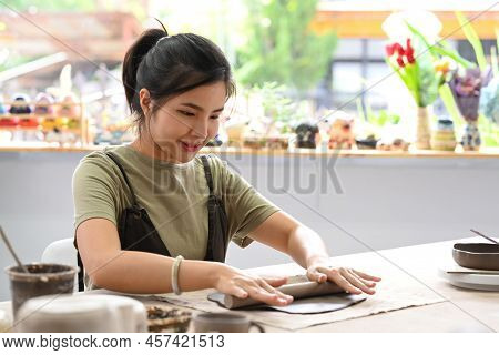 Young Female Ceramicist Creating Handicraft Crockery In Ceramics Studio. Activity, Handicraft, Hobbi