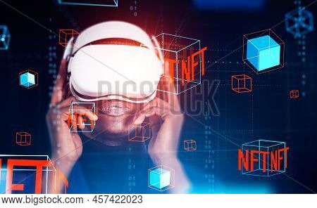 African Businessman In Vr Headset, Digital Nft Hologram With Data Blocks And Binary, Blockchain In M