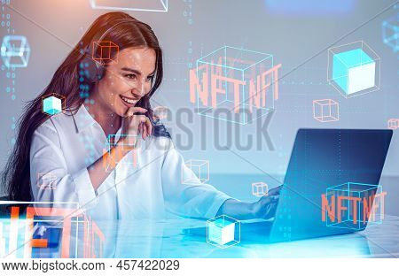 Smiling Woman Portrait Working With Laptop, Listening To Podcast. Digital Hologram Of Nft Data Block