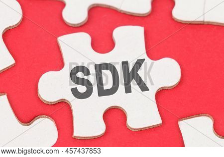 Internet And Security. On A Red Background, Among White Puzzles Lies A Puzzle With The Inscription -