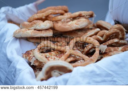 Selling A Lot Of Pretzels From A Basket