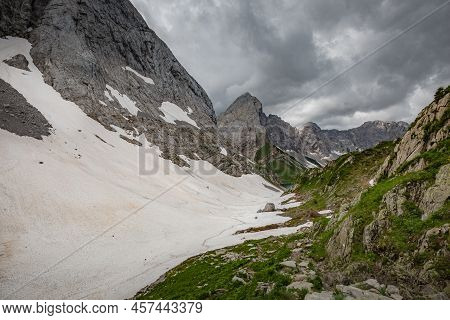 Mountain Hiking Trail Road. Small Mountain Lake. Between Italy And Austria: Near Volaia Lake Raunchk