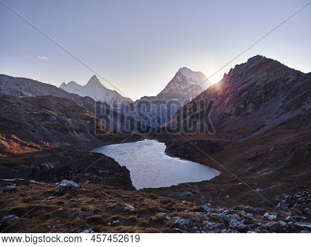 Mount Jampayang, Mount Chanadorje And Lake Boyongcuo At Sunset In Yading National Park, Daocheng Cou