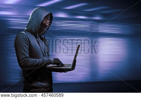 Hacker Using Laptop. Hacking The Internet In Computer