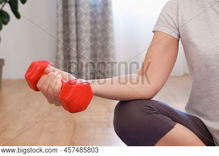 Home Workout With Laptop And Work At Home Concept. Fitness Woman Watching Online Lesson At Laptop An