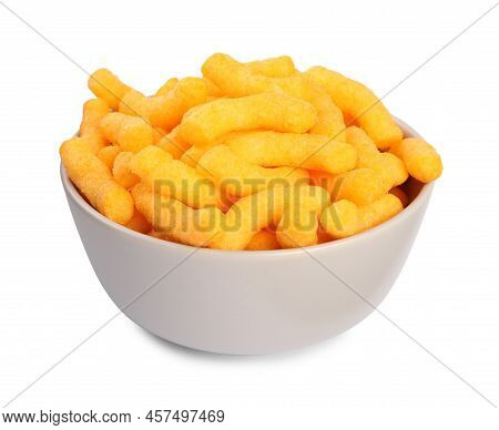 Many Tasty Cheesy Corn Puffs In Bowl Isolated On White