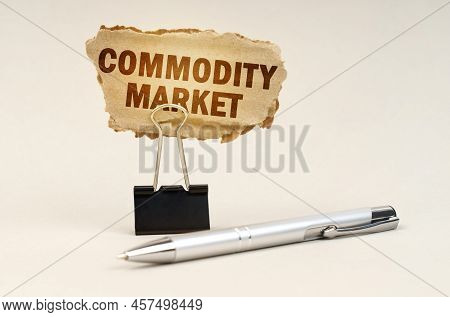 Industry And Business Concept. Next To The Handle Is An Office Clip With A Sign. On The Plate Is The
