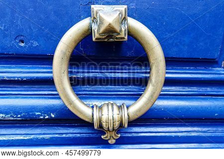 European Vintage Old Metal Wrought Iron Door Knocker. Design Detail. Paris.