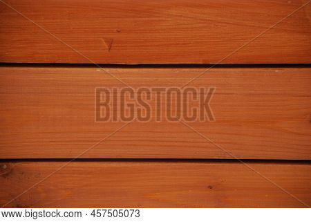 Three Brown Wooden Boards Screwed With Self-tapping Screws. Three Horizontally Arranged, Bright Brow