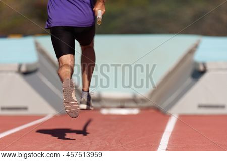 Run-up Male Athlete Pole Vault At Athletics Competition