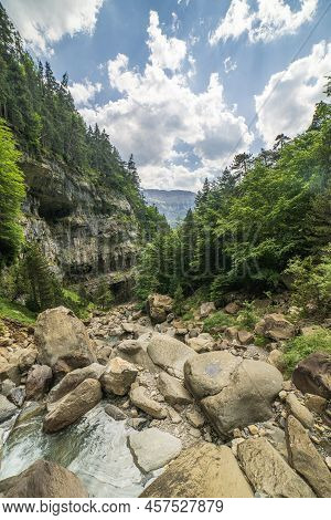 Cotatuero Waterfall And River In The Ordesa And Monte Perdido National Park.