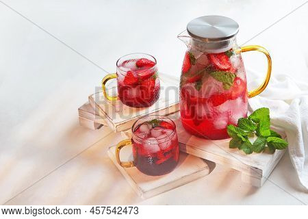 Strawberry Lemonade In A Jug And Two Glass Glasses. Modern Glassware.summer Drinks Season. Strawberr