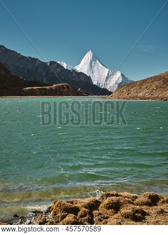 Mount Jampayang And Lake Boyongcuo In Yading National Park, Daocheng County, Sichuan Province, China