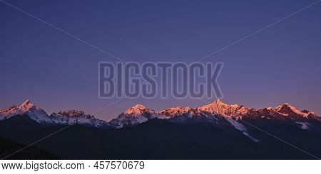 Kawabego Peak Of The Meili Snow Mountain At Sunrise In Yunnan Province, China