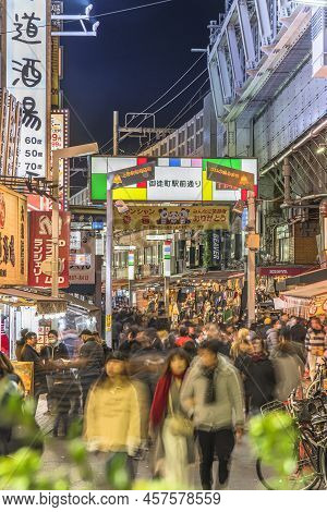 Tokyo, Japan - January 02 2022: Crowd Of Tourists Walking On The Ameyoko Shopping Street At Okachima