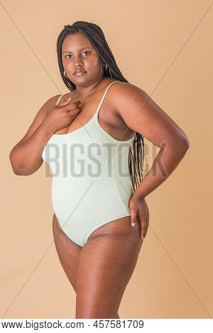 Curvy Plus Size Model. Overweight Body Acceptance Confidence. Latin Cuban Body Positive Unretouched