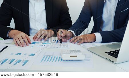 Group Of Business People Analysis Summary Graph Reports Of Business Operating Expenses And Work Data