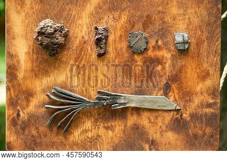 Ore And Sample Products Of A Medieval Blacksmith For The Manufacture Of Metal Products. Reconstructi