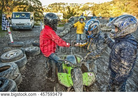 Schmitten, Germany - October 19, 2009: Children Love To Race With A Quad At The Muddy Quad Track.