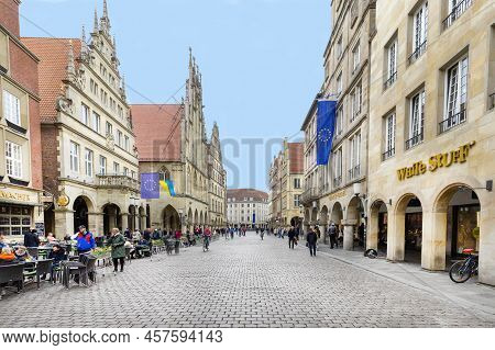 Muenster, Germany - April 29, 2022: Scenic View To Facade Of Old Historic Houses In Panoramic View A