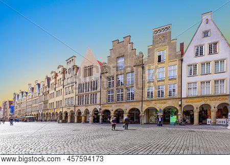 Muenster, Germany - April 29, 2022: Scenic View To Facade Of Old Historic Houses In Panoramic View A